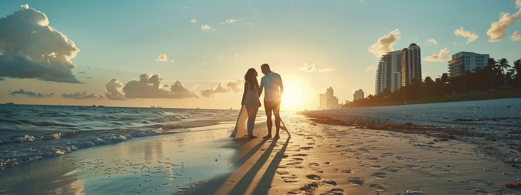 a bride and groom posing elegantly on a picturesque miami beach while a professional photographer captures their special moment.