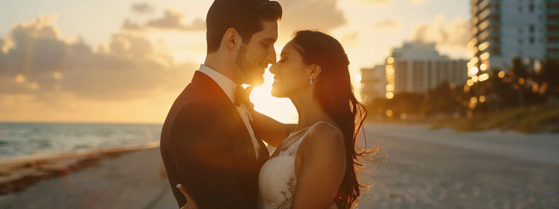 a glamorous bride and groom sharing a loving embrace on a scenic miami beach at sunset, captured by a skilled wedding photographer.